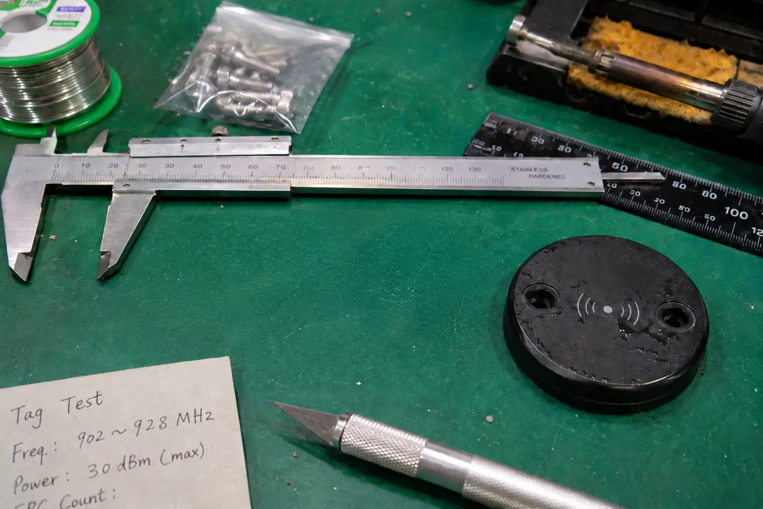 A close-up shot of a durable, industrial-grade RFID tag