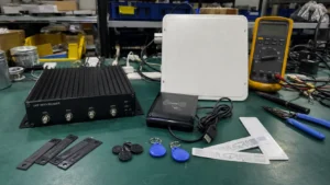 Fongwah comprehensive RFID technology showcase with industrial UHF tags, fixed readers, and patch antennas on a test bench.