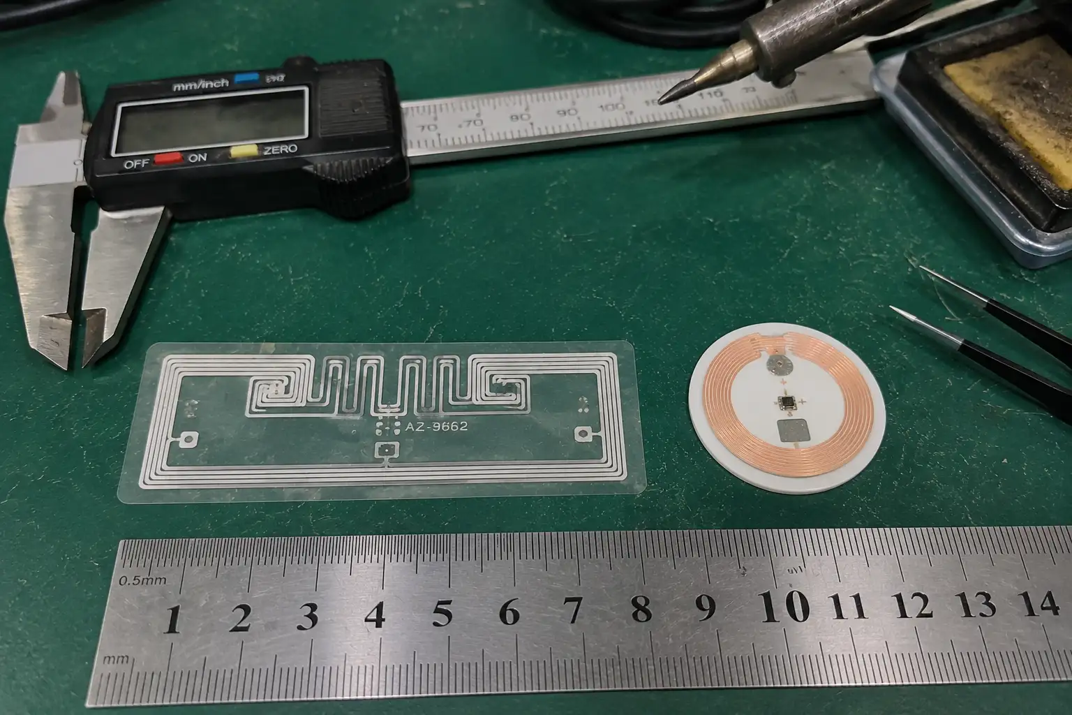 Close-up comparing an RFID tag and an NFC chip