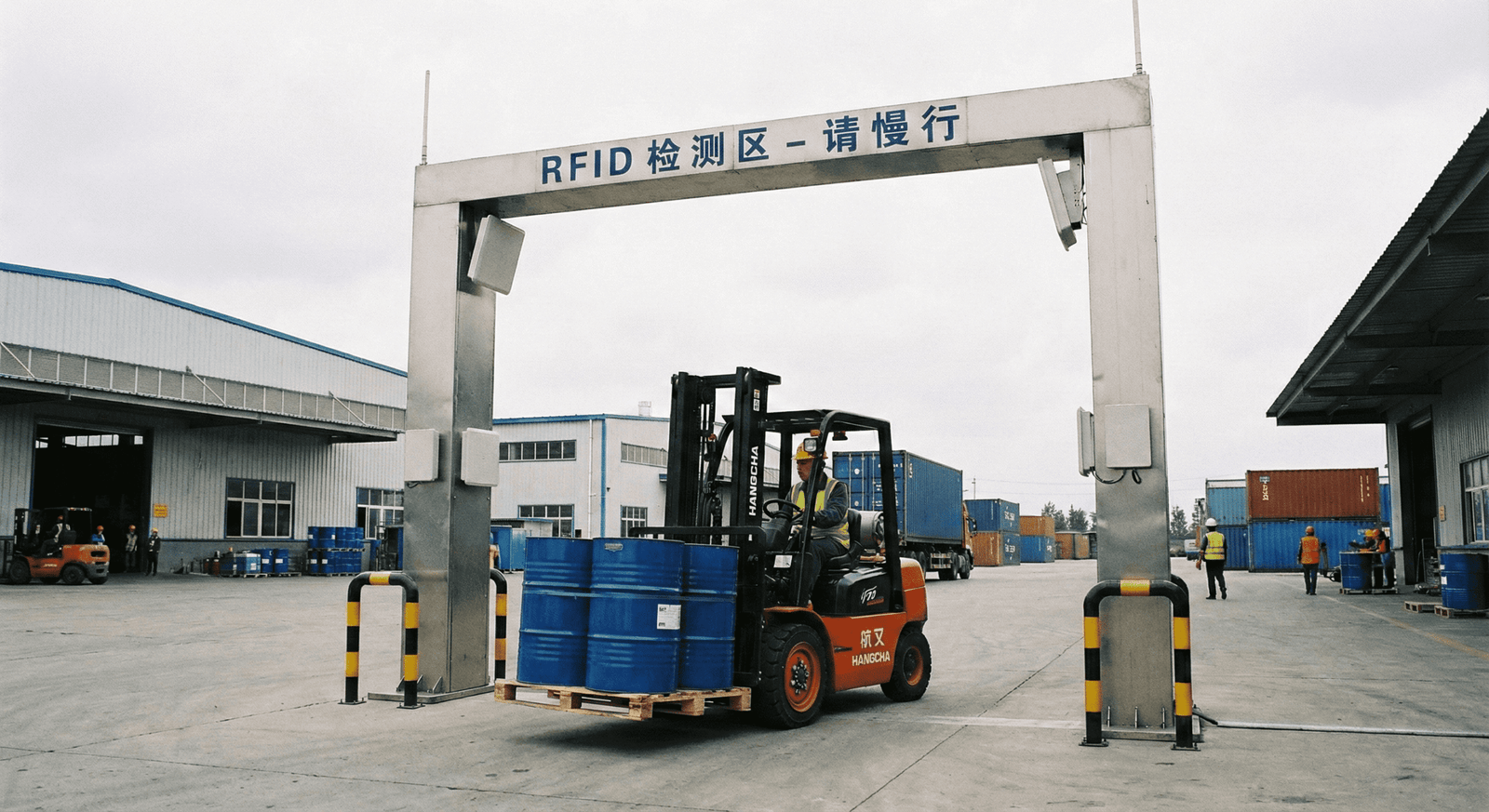 forklift carrying metal drums passing rfid reader gate