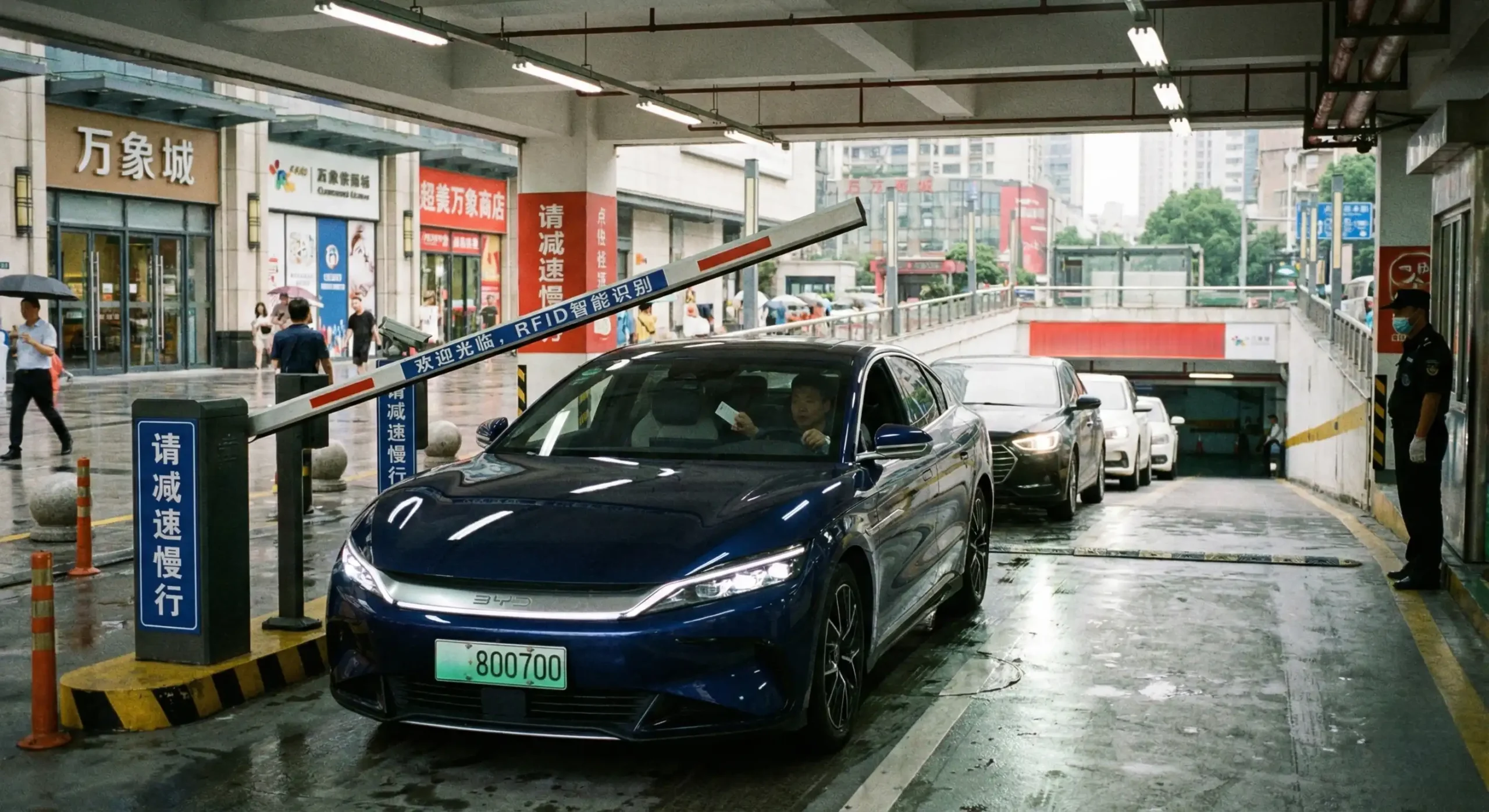car entering parking lot with rfid barrier gate opening