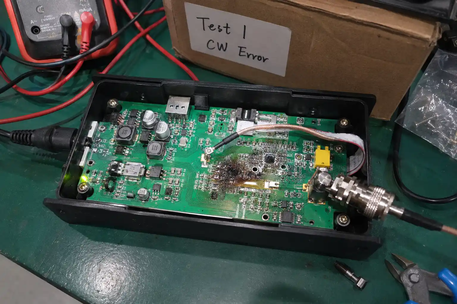 Infrared thermal image capturing an extreme localized hotspot on an unshielded reader PA during a high-volume card encoding round